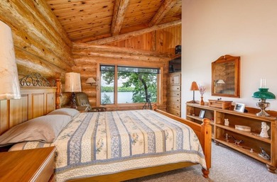 Set on 193 feet of private Bluewater Lake shoreline with - photo 20