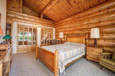 Set on 193 feet of private Bluewater Lake shoreline with - photo 21