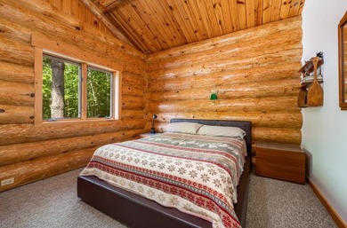 Set on 193 feet of private Bluewater Lake shoreline with - photo 22