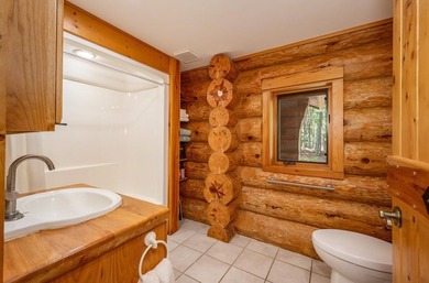Set on 193 feet of private Bluewater Lake shoreline with - photo 23
