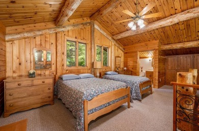 Set on 193 feet of private Bluewater Lake shoreline with - photo 31