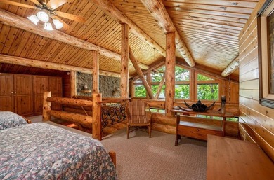 Set on 193 feet of private Bluewater Lake shoreline with - photo 32