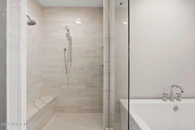 Welcome to the exquisite TOP floor 2-story penthouse at Building - photo 33