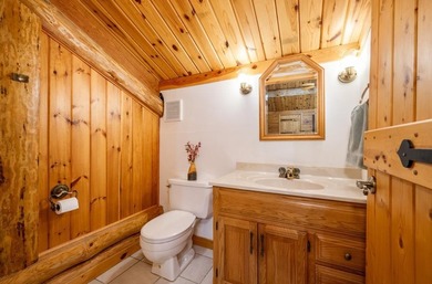 Set on 193 feet of private Bluewater Lake shoreline with - photo 34