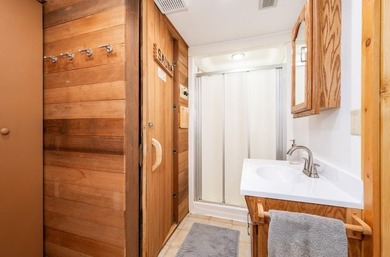Set on 193 feet of private Bluewater Lake shoreline with - photo 37