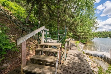 Set on 193 feet of private Bluewater Lake shoreline with - photo 43
