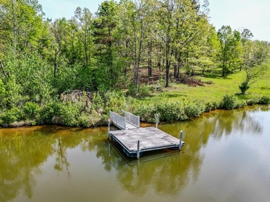 Beautiful 5.48+/- acre dream lot in THE HIGHLANDS! Features a - photo 1