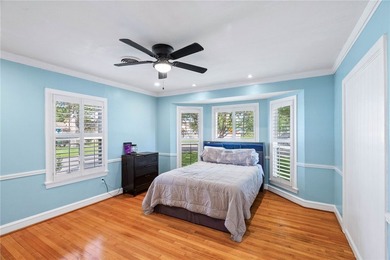 This beautifully updated 4-bedroom, 2.5-bath home offers the - photo 12