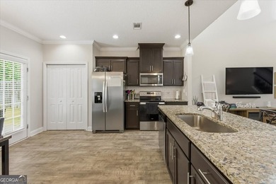 This home is immediately set apart by the custom design - photo 5