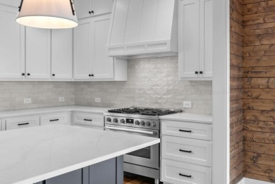 Stunning new construction positioned on a premium lot in the - photo 14