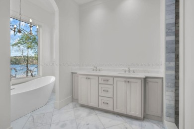Stunning new construction positioned on a premium lot in the - photo 21