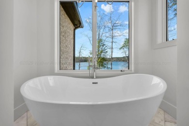 Stunning new construction positioned on a premium lot in the - photo 22