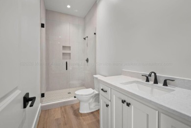 Stunning new construction positioned on a premium lot in the - photo 24