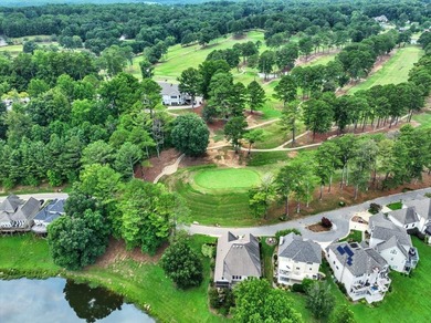 Brick home with a great view of golf course on one side and a