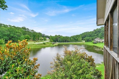 Brick home with a great view of golf course on one side and a