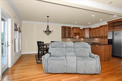 Brick home with a great view of golf course on one side and a