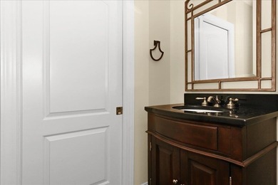 Brick home with a great view of golf course on one side and a