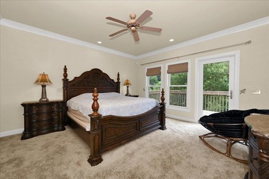 Brick home with a great view of golf course on one side and a