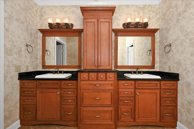 Brick home with a great view of golf course on one side and a