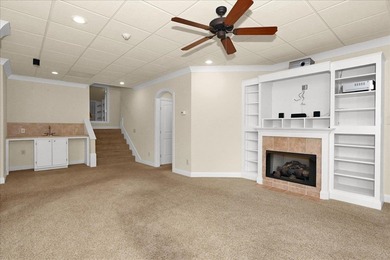 Brick home with a great view of golf course on one side and a