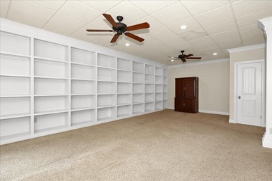 Brick home with a great view of golf course on one side and a