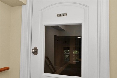 Brick home with a great view of golf course on one side and a