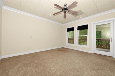 Brick home with a great view of golf course on one side and a