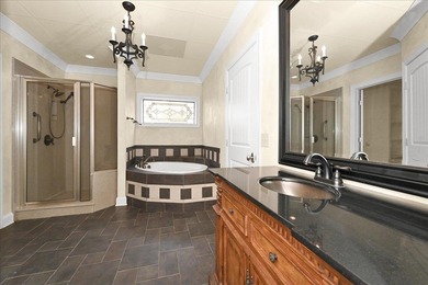 Brick home with a great view of golf course on one side and a