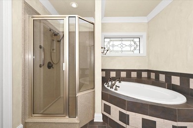 Brick home with a great view of golf course on one side and a