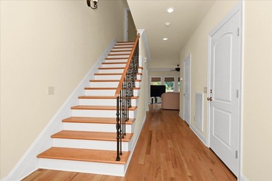 Brick home with a great view of golf course on one side and a