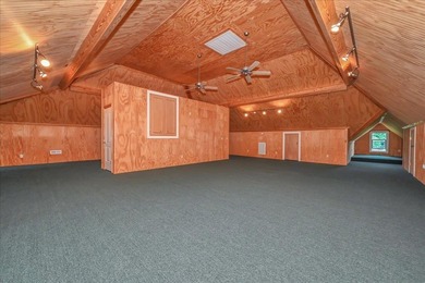 Brick home with a great view of golf course on one side and a