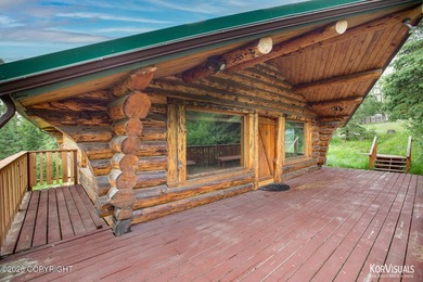 Experience the warmth and character of log home living in this - photo 1