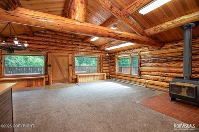 Experience the warmth and character of log home living in this - photo 6
