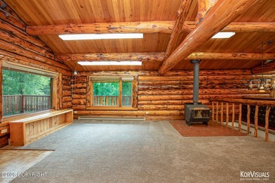 Experience the warmth and character of log home living in this - photo 7