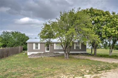 Lake Home For Sale in Sandia, Texas