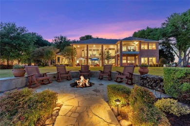 This breathtakingly majestic home sits on .90 beautifully - Lake Home For Sale in Mabank, Texas
