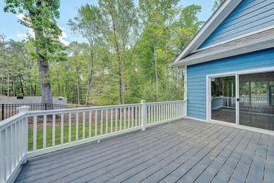 Stunning contemporary home w/seasonal lake views offers modern - photo 27