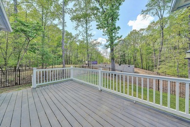 Stunning contemporary home w/seasonal lake views offers modern - photo 28