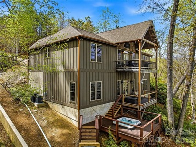 Builder's custom lakefront double lot retreat, showcasing - photo 3