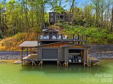 Builder's custom lakefront double lot retreat, showcasing - photo 6