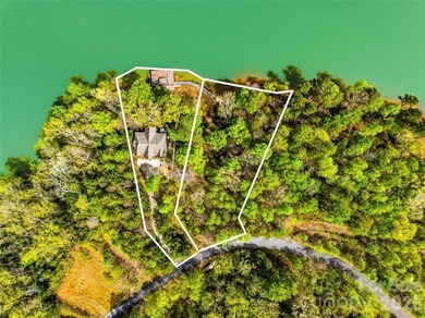 Builder's custom lakefront double lot retreat, showcasing - photo 7
