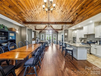 Builder's custom lakefront double lot retreat, showcasing - photo 10