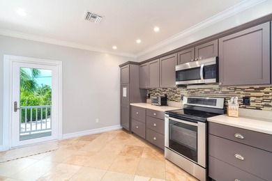 Welcome to an exquisite open-water retreat in Big Pine Key, an - photo 13
