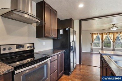 Enjoy open views of rolling hills from the 30 x 15 deck. This