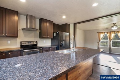 Enjoy open views of rolling hills from the 30 x 15 deck. This