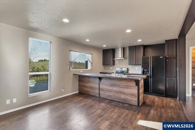 Enjoy open views of rolling hills from the 30 x 15 deck. This