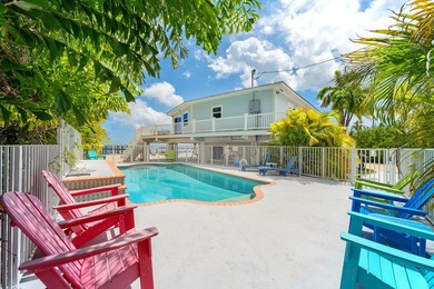Welcome to an exquisite open-water retreat in Big Pine Key, an - photo 34