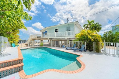 Welcome to an exquisite open-water retreat in Big Pine Key, an - photo 35