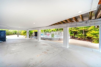 Welcome to an exquisite open-water retreat in Big Pine Key, an - photo 44