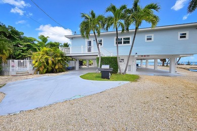 Welcome to an exquisite open-water retreat in Big Pine Key, an - photo 45